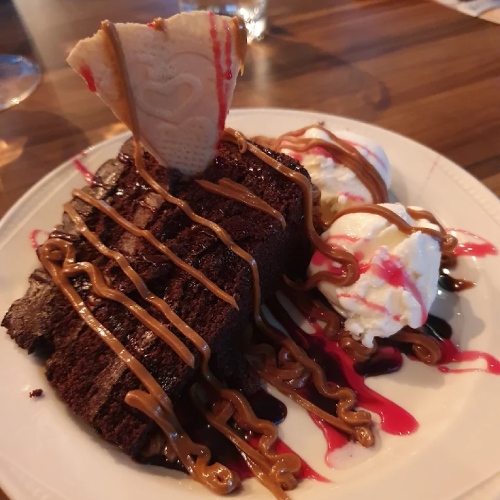 Aroma Bar & Restaurant Chocolate Cake with Ice cream in Broxburn. 